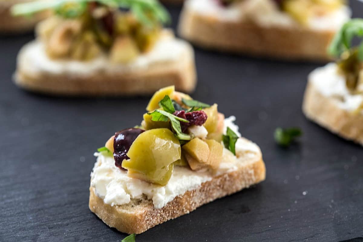 Mixed Olive and Whipped Feta Crostini - Gal on a Mission